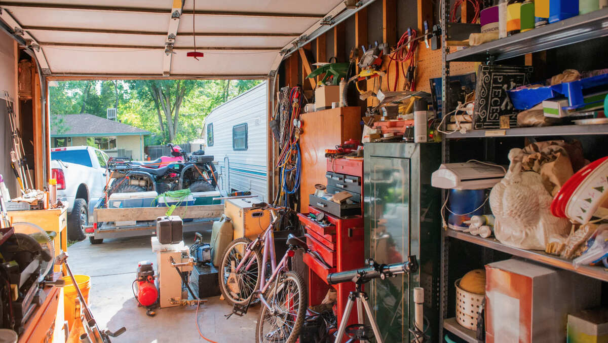 Garage packed with clutter ready for a cleanout